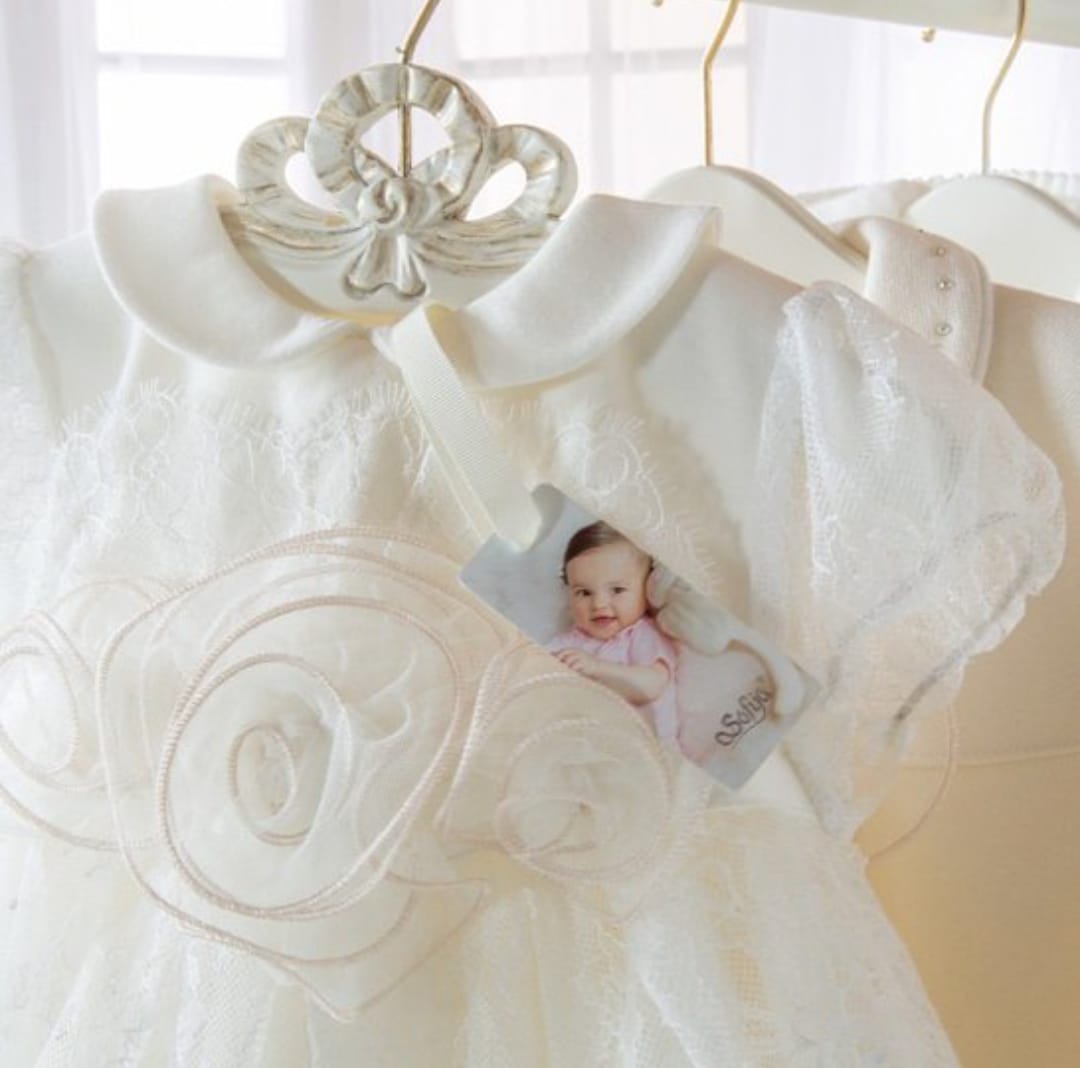 Elegant Girls' Ecru Dress Beautifully Decorated With Lace
